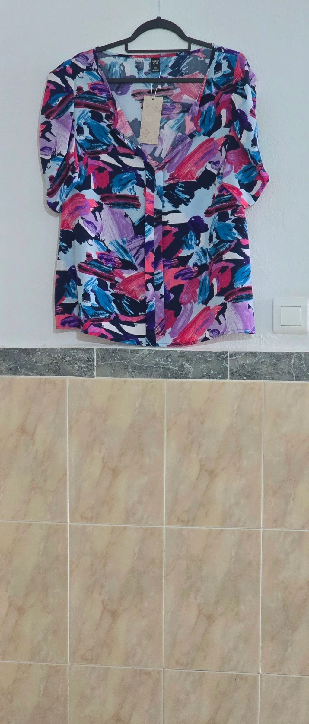 Blusa multicolor de manga corta farol